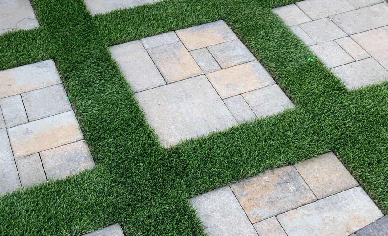 Decorative paver and artificial turf combination installation
